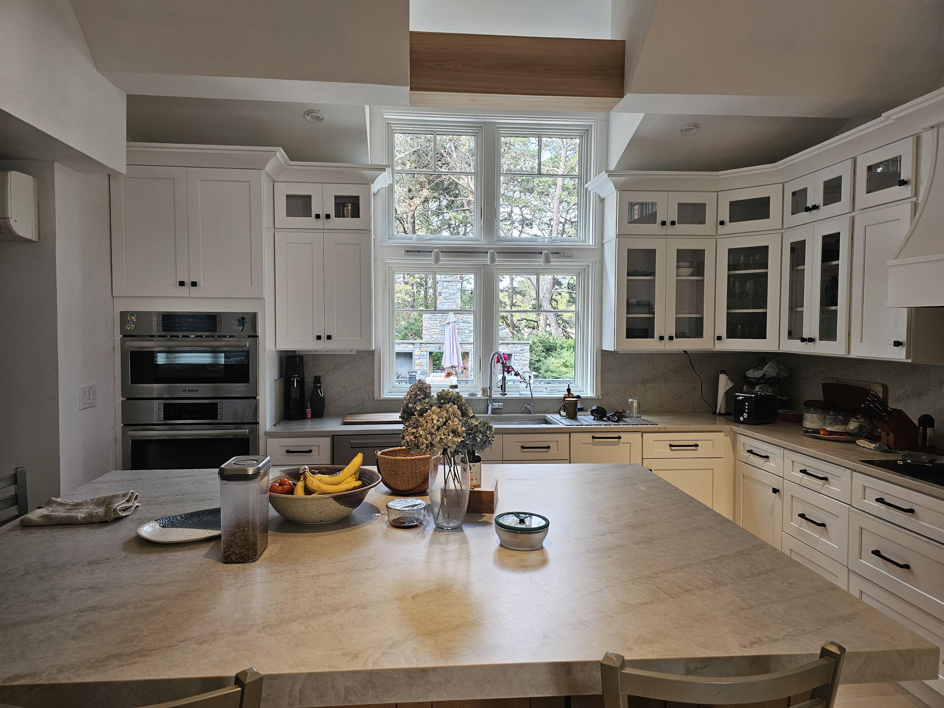 Stacked Windows Over the Sink - Cape Cod kitchen remodel by On Cape Kitchens