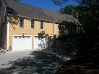 After: New house with garage addition